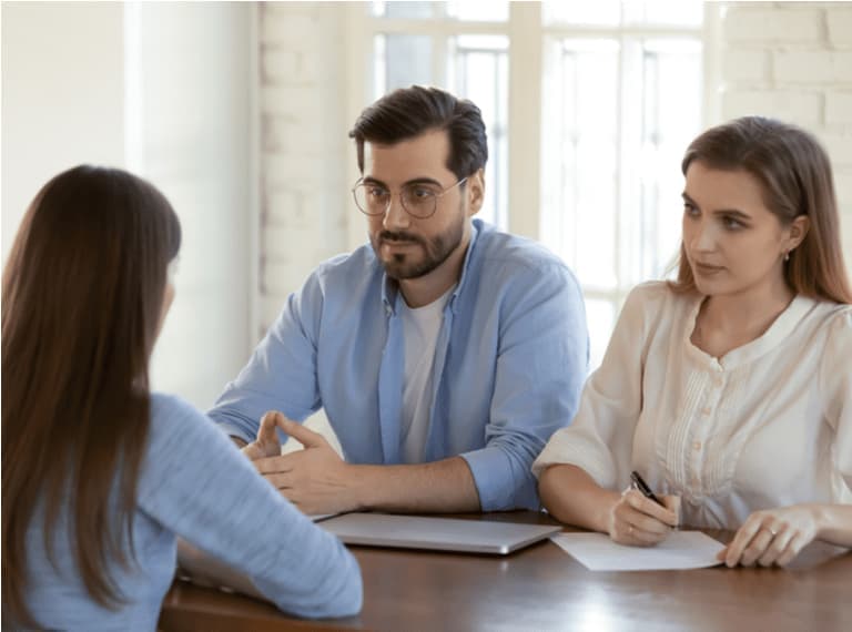 Two employers asking questions at a candidate’s second interview.