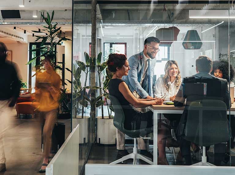 Team talking in meeting room