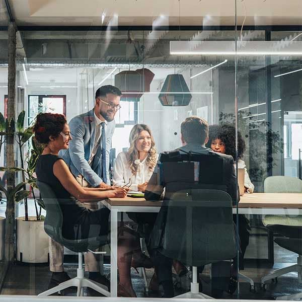 HR team discuss Emplyment Rights Act 2025 in meeting room