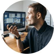 Man talking on the phone at a desk